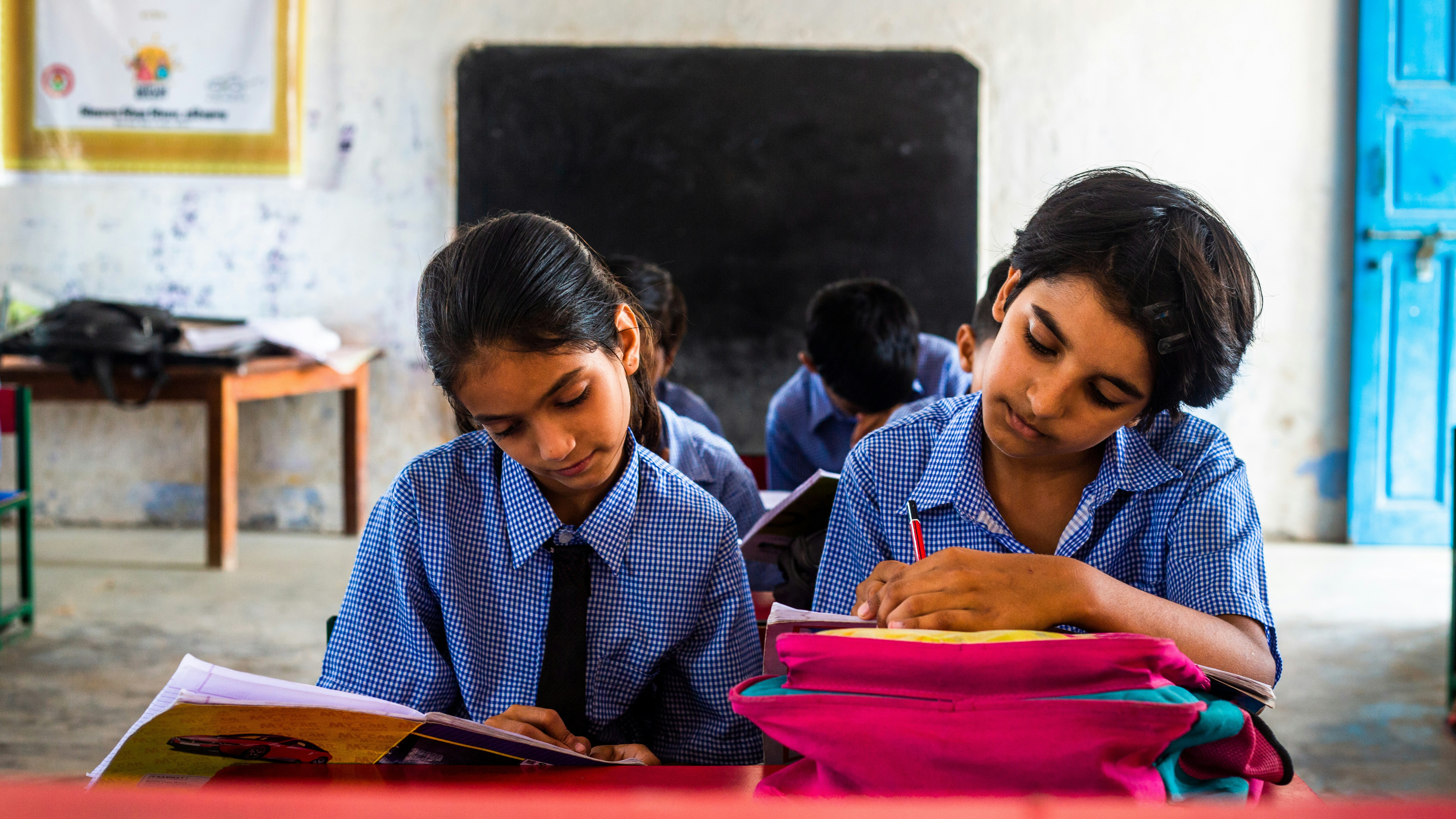 Students in classroom supported by scholarship